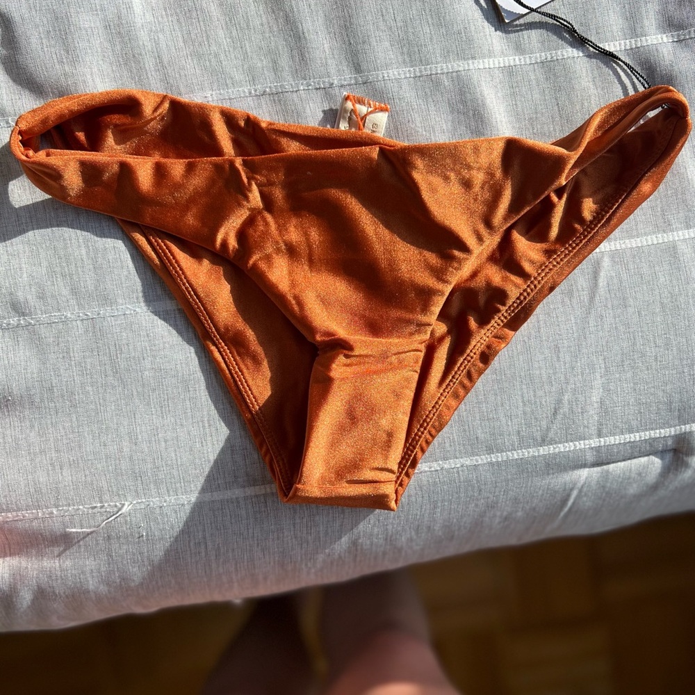 Balboa Top in Rustic Orange. Never worn. Tags still on top and bottom